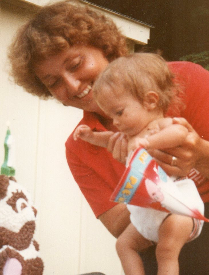 My mom and I on my first birthday.